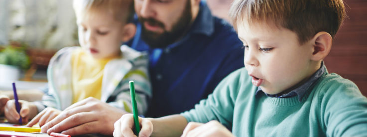 children coloring with dad